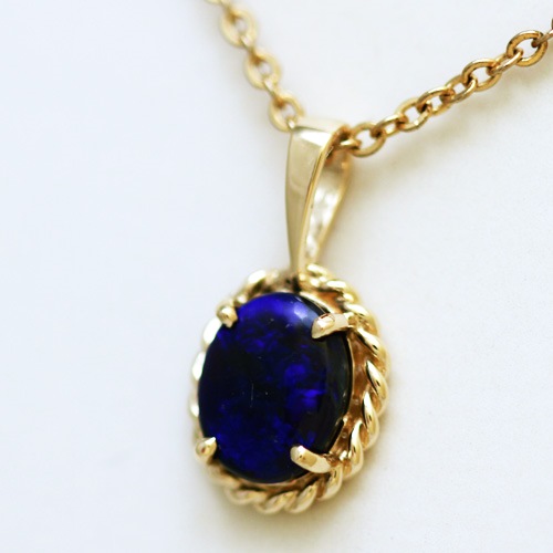 14k Yellow Gold Pendant with a SOLID BLACK OPAL Floral Harlequin pattern, sparkling and bright